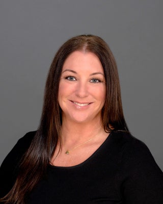 Portrait of Stephanie Anderson, Broker